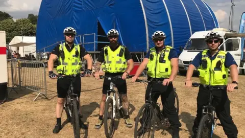 NorthBedsPolice Officers, including Insp Ayling (second from left), at Bedford River Festival