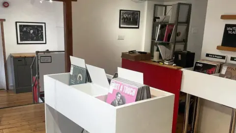 Chris Farrell An empty record store with a few records in storage