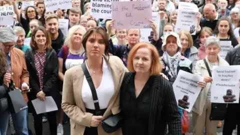 PA Natasha O'Brien and Ruth Coppinger at a protest outside Leinster House in Dublin