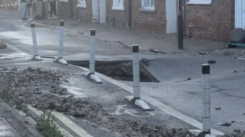 Stewart Gray A photo of the tarmac having sunk into the ground
