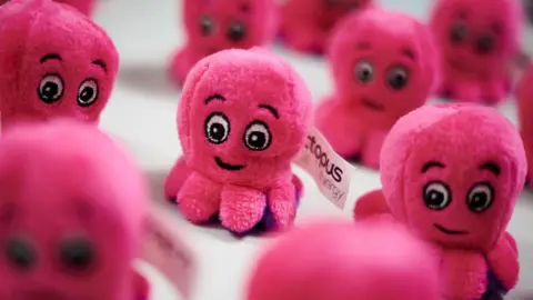 Leon Neal/PA Wire Octopus Energy promotional toys at the headquarters of Octopus Energy in London.