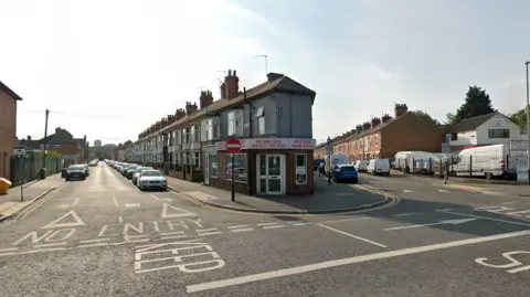 Google Two terraced streets with cars and cars parked on them