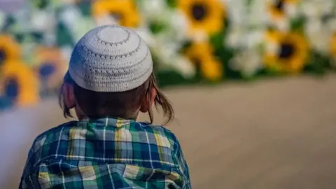 Alamy Boy wearing a Jewish skullcap, or kippa