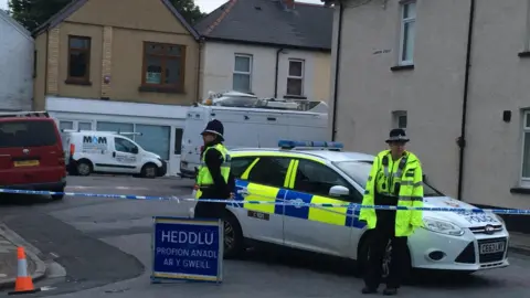 Police officers at the cordon on Jeffrey Street in Newport