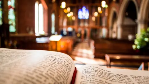 Getty Images open bible on altar in Anglican Church