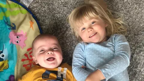 Family photo Gunner and his older sister