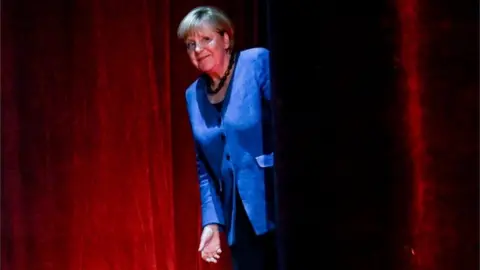 EPA Former German Chancellor Angela Merkel during "So what is my country?" conversation with Alexander Osang at the Berliner Ensemble in Berlin, Germany, 07 June 2022