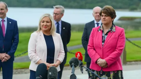 PACEMAKER First Minister Arlene Foster and Deputy First Minister Michelle O'Neill welcome their counterparts to Fermanagh for the British Irish Council Summit