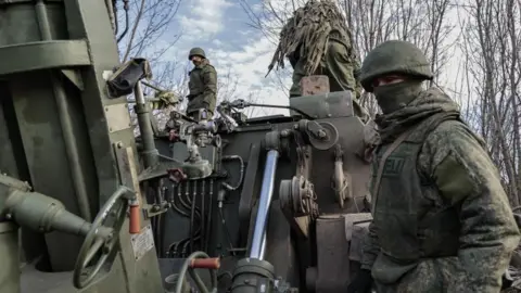 EPA Forces of the self-proclaimed Donetsk People's Republic prepare to fire a self-propelled mortar 2S4 'Tulip' not far from Bakhmut, Donetsk region, Ukraine, 01 December 2022