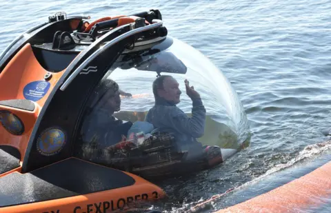 Reuters Russian President Vladimir Putin in a submersible in the Gulf of Finland, 27 July