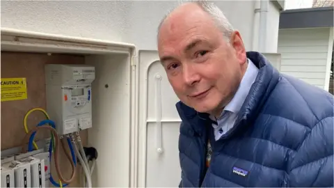 BBC Patrick Langmaid with the energy meter
