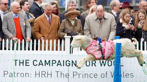 Getty Images Prince Charles, Camilla, Duchess of Cornwall and Sir Nicholas Soames watch the sheep race at The Prince's Countryside Fund Raceday at Ascot in March, 2015