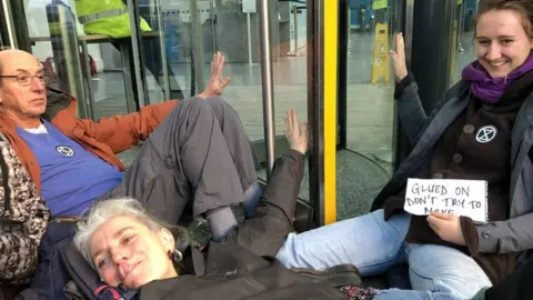 Protesters blockading the offices of the UK's energy department