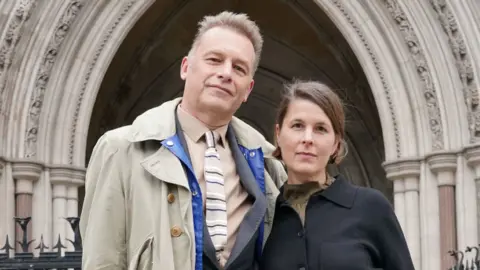 PA Media Chris Packham and Charlotte Corney