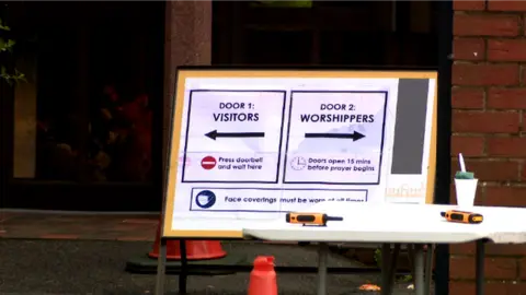 Mosque social distancing signs