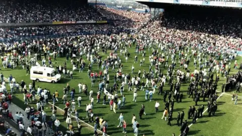 BBC general view of fans on the pitch