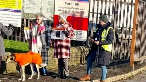 BBC Campaigners outside Ford Hill waste recycling centre