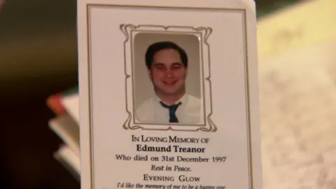 The mass card for Eddie Treanor, who was murdered by loyalist paramilitaries in December 1997