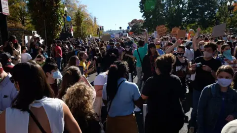 Crowds gather by the White House after Biden wins presidency