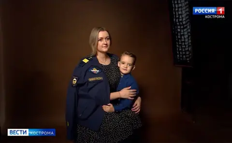 GTRK Kostroma Soldier's wife with his uniform