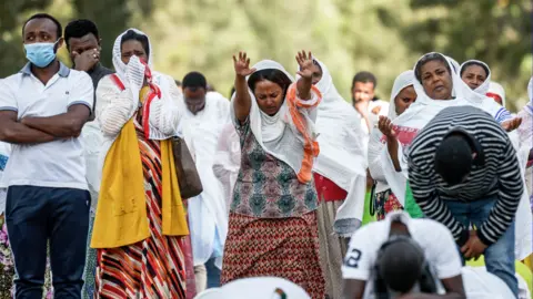 AFP Orthodox Christians praying on the streets of Addis Ababa, Ethiopia - Sunday 5 April 2020