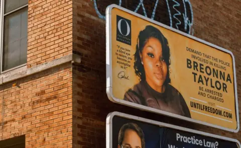 Getty Images Billboards around Louisville call for the three officers to be arrested