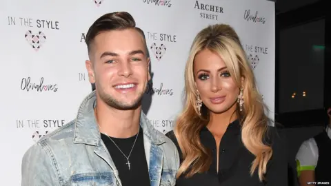 Getty Images Chris and Olivia