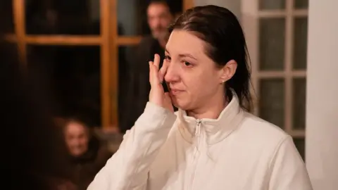 Joe Giddens/PA Wire Valeriia at the home where her family has been reunited