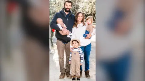 Courtesy Upper Makefield Township Police Jim Sheils with Katie Seley and the couple's children