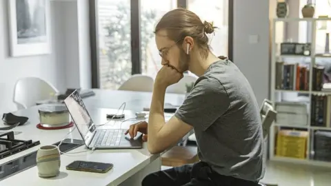 Getty Images Man working from home