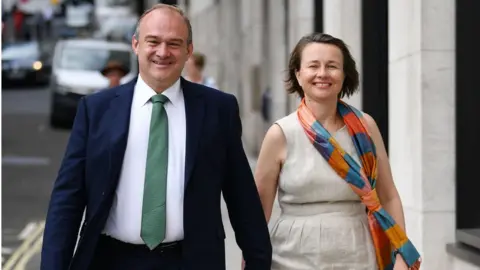 Getty Images Ed Davey with wife Emily