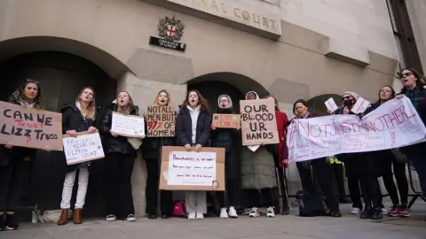 PA Media Supporters from the Sabina Project outside the Old Bailey, central London
