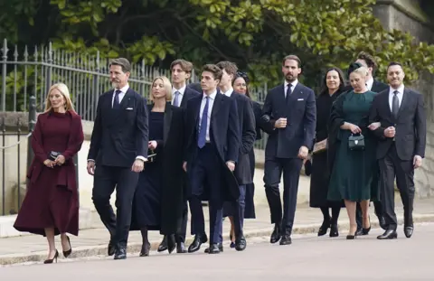 PA Media Crown Prince Pavlos and his wife Marie-Chantal arrive at St George's Chapel