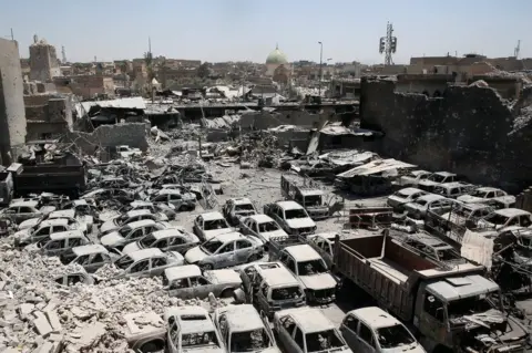 Reuters Remains of the destroyed Great Mosque of al-Nuri (background) and the al-Hadba minaret in the Old City of Mosul