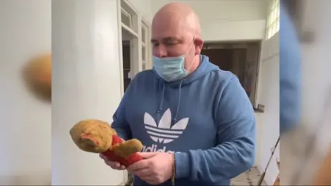 Guy Wright has been reunited with his childhood teddy bear