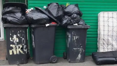 Overflowing bins