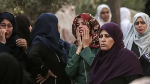 AFP Palestinian women mourn Hamas member killed by Israel (28/05/18)