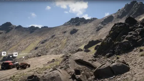 Microsoft Two cars race on the path along the cliff of a volcanic caldera