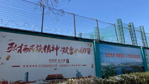 Getty Images The outside of the Qingdao Taekwang Shoes Co. factory, where Uighur workers make shoes