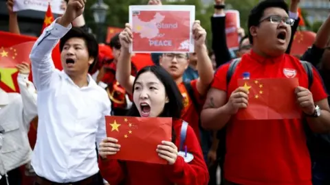 Reuters Pro-Beijing demonstrators take to the streets of London