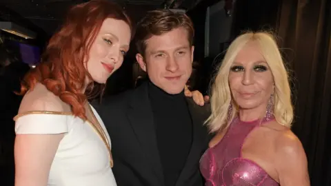 Getty Images (Left to right) Karen Elson, Daniel Lee and Donatella Versace