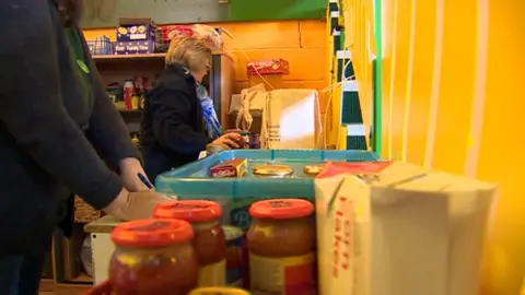 BBC Volunteers stack food at a food bank in Ebbw Vale