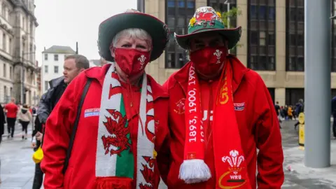 Getty Images Two people in Wales face masks