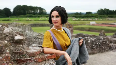 English Heritage A model recreates a Roman make-up look