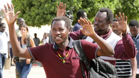Reuters South Sudanese political detainees and prisoners of war walk out of prison in the capital, Juba, South Sudan - Thursdasy 25 October 2018