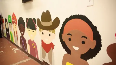 US Government Murals adorn the walls of the former Walmart