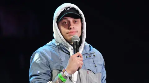 Getty Images Pete Davidson on stage