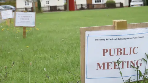 Public meeting signs