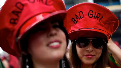 AFP girls in red hats