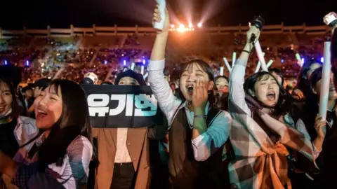 AFP Fans cheer for their a professional K-pop band in Changwon, South Korea